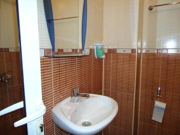 Фото номера Трехместный номер с балконом Отель Dionis Hotel г. Петрич 13