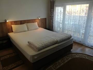 Фото номера Двухместный номер с 2 отдельными кроватями Гостевой дом Family Hotel May г. Петрич 6