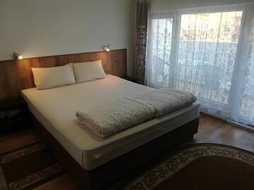 Фото номера Двухместный номер с 2 отдельными кроватями Гостевой дом Family Hotel May г. Петрич 19